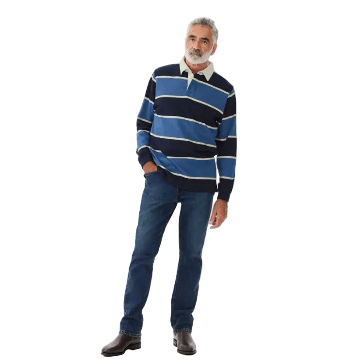 A man wearing a blue, navy and white striped R.M.Williams Men's Tweedale Rugby (KR200JSFW01) on a white background.