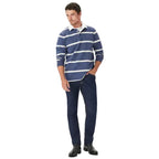 Man wearing a blue and grey marle R.M.Williams Men's Tweedale Rugby (KR200RJ07) and dark jeans on a white background.