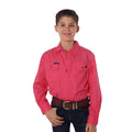 A smiling boy stands with one hand in his pocket, wearing the Ringers Western Childrens Ord River Half Button L/S Work Shirt (171310001) in Melon, dark jeans, and a brown belt against a white background.