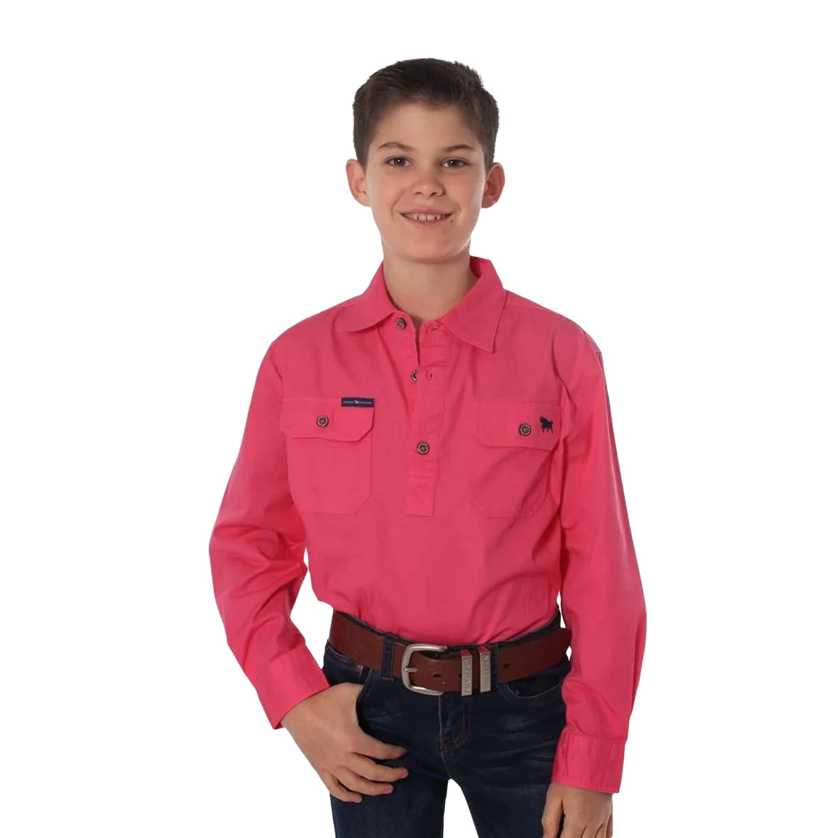 A smiling boy stands with one hand in his pocket, wearing the Ringers Western Childrens Ord River Half Button L/S Work Shirt (171310001) in Melon, dark jeans, and a brown belt against a white background.