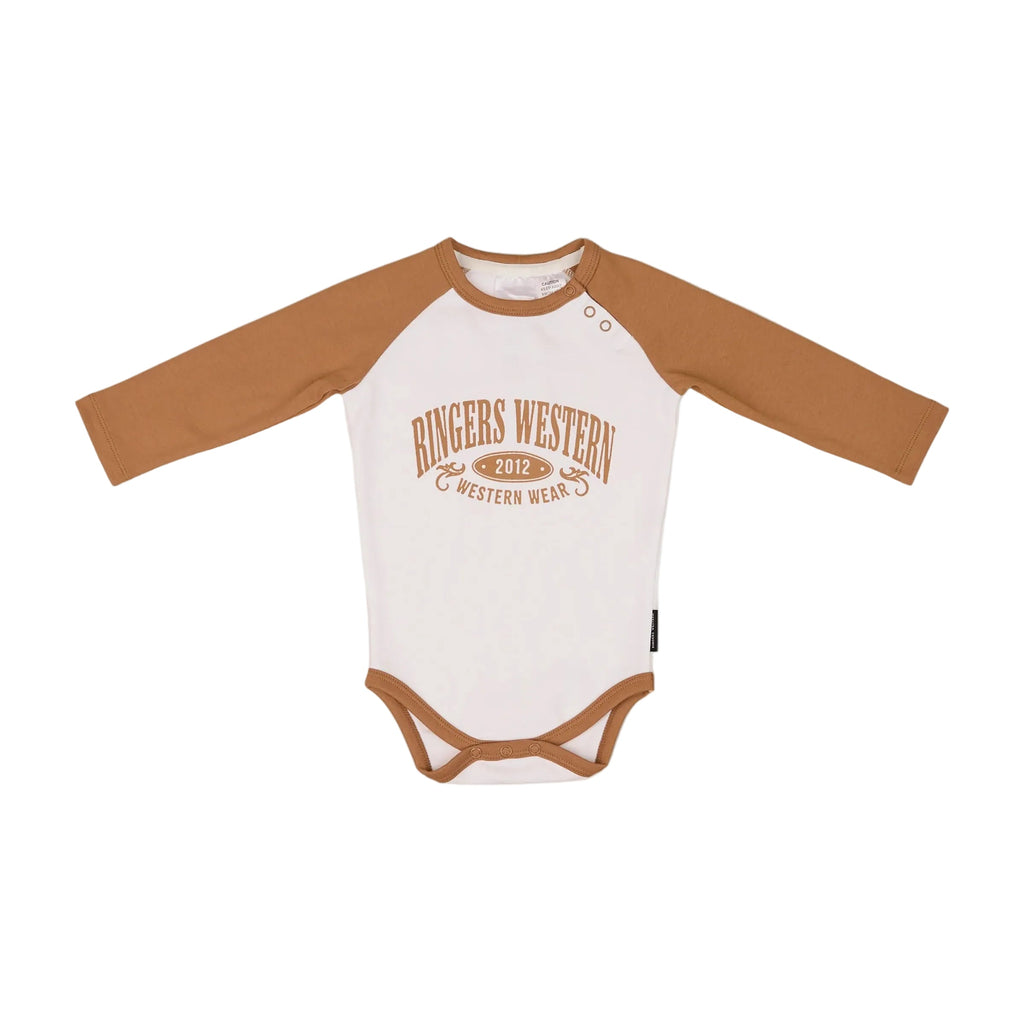 The Ringers Western Infants Western Bub L/S Romper (525010RW) in White/Clay features brown sleeves and trim, a "RINGERS WESTERN 2012 WESTERN WEAR" print, and is made from 100% cotton—ideal for little fans of western style.