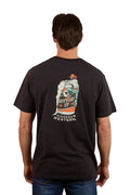 A man is seen from the back wearing a Ringers Western Mens Bottoms Up Loose Fit S/S Tee in washed black, featuring a colorful hand holding a can graphic with "Bottoms Up" and "Ringers Western" printed beneath.