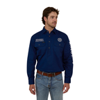 A man stands against a white background wearing the Ringers Western Mens Hawkeye Half Button L/S Work Shirt in navy, featuring "Ringers Western" logos, paired with blue jeans and a brown belt.