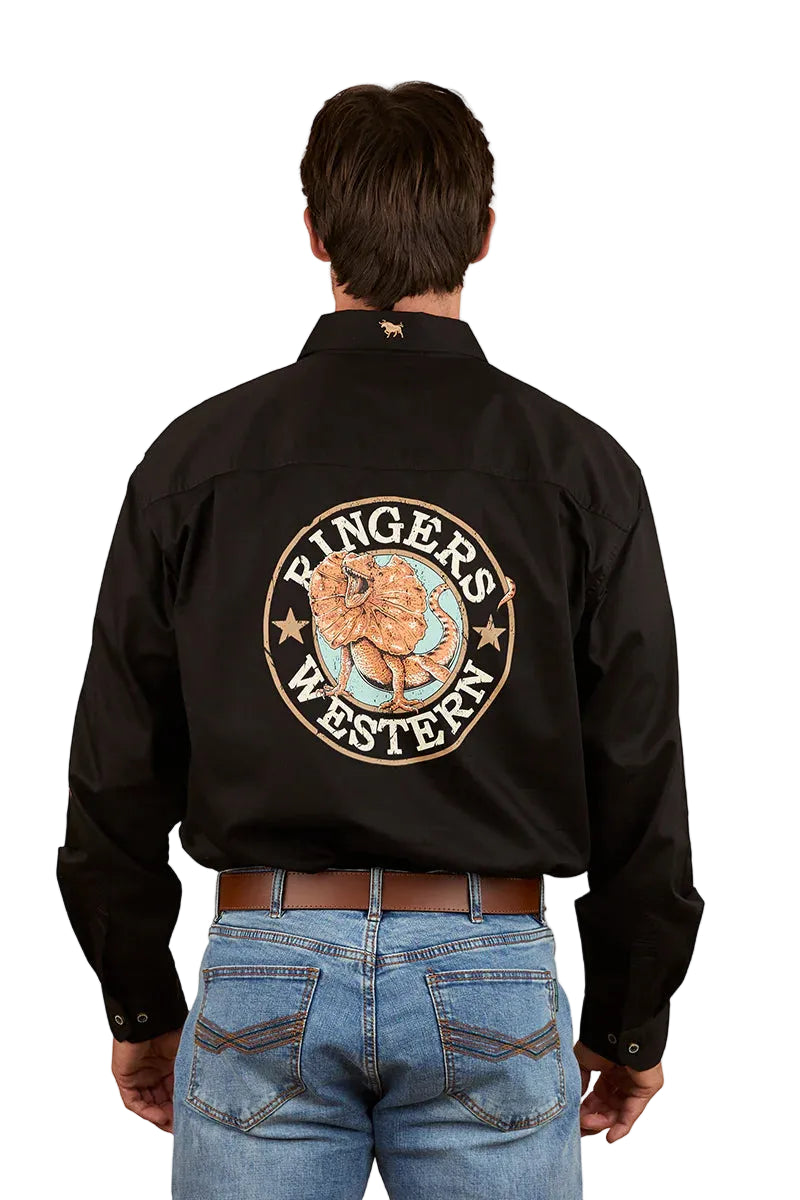 A man wears the Ringers Western Mens Hawkeye Printed Full Button L/S Work Shirt (125093RW) Black/Clay, featuring a bold "Ringers Western" logo and bull’s head on the back, paired with blue jeans. This cotton shirt offers UPF 50+ protection.