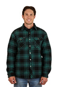 A man with short brown hair, wearing blue jeans and the Ringers Western Mens Sawyer L/S Sherpa Flannel Shirt in Pine/Charcoal, smiles while facing forward against a plain white background, highlighting this classic winter workwear piece.