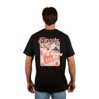 A man stands against a plain white background wearing the Ringers Western Men's Whiskey Business Loose Fit S/S Tee (125036RW) in black, featuring a cartoon character with a boombox printed in red and white on the back. Crafted from 100% cotton jersey.