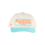 A cream-colored baseball cap with a light blue visor and matching light blue button on top. The front features a rectangular patch with orange text reading 'Ringers Western Road House' and a small orange logo on the side.