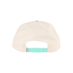 Back view of a structured baseball cap in off-white with a light turquoise snapback strap and matching top button, shown on a plain white background.