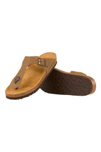 The Ringers Western Unisex Bondi Leather Cork Thongs (425092RW) in Tobacco feature nubuck leather straps, a metal buckle, natural cork footbeds, and black rubber outsoles; one sandal shows the tread, the other lies flat.