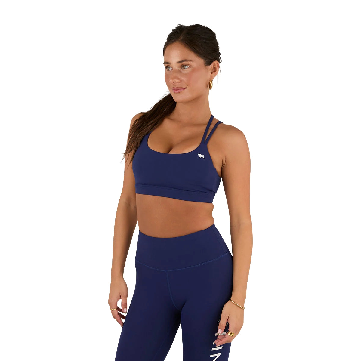 A woman models the Ringers Western Womens Anikafit Signature Crop Top (225010RW) in Midnight, standing against a white background and looking to the side with a relaxed, confident expression.