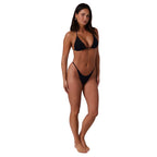 A woman modelling a black Ringers Western Women's Gigi Adjustable Strap G String High Cut (225204RW) against a solid white background.