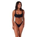 A woman modelling a black Ringers Western Women's Luna Lace Front Bralette Top (225209RW) on a white background.