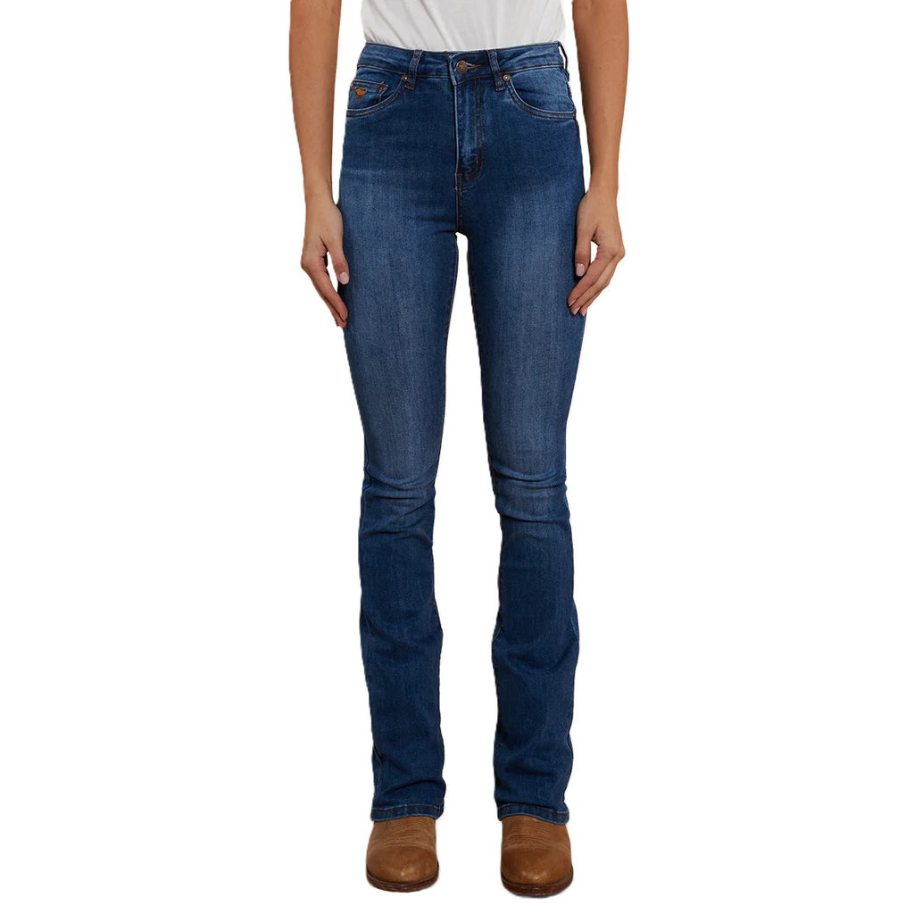 A woman modelling a pair of Vintage Blue Wash Ringers Western Women's Penny Rodeo High Rise Bootleg Jeans (222104RW) on a white studio background.