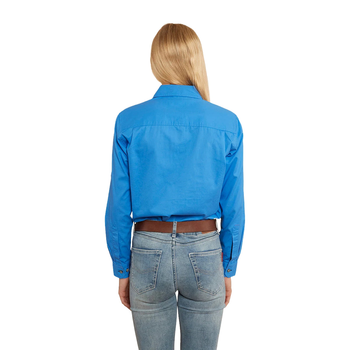 A woman with long blonde hair has her back to the camera, wearing a Ringers Western Women's Pentecost River Half Button Work Shirt in Blue and blue jeans with a brown belt. The background is plain white.