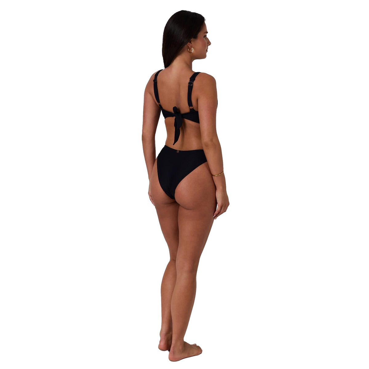 A woman viewed from 3-4 back, modelling a black Ringers Western Women's Taryn Classic Regular Cover Bikini (225206RW) on a white studio background.