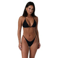 A woman modelling a black Ringers Western Women's Vixen Classic Sliding Triangle Bikini Top (225208RW) on a white studio background.