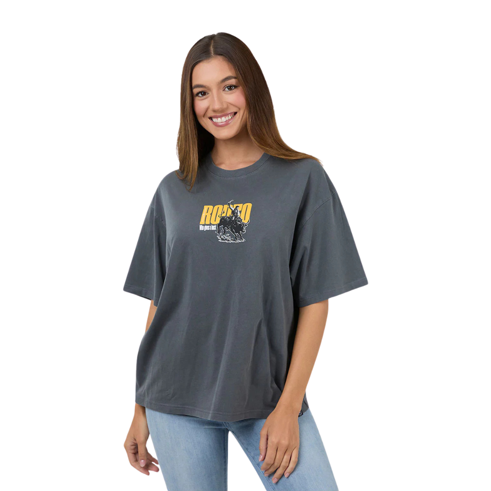 Woman wearing a Ringers Western Womens Who Gives A Buck S/S Oversized Tee (225120RW) Washed Black on a white background