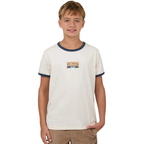Young boy wearing a white t-shirt with a logo on a white background