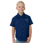 Child wearing a blue shirt with a brand logo on a plain background