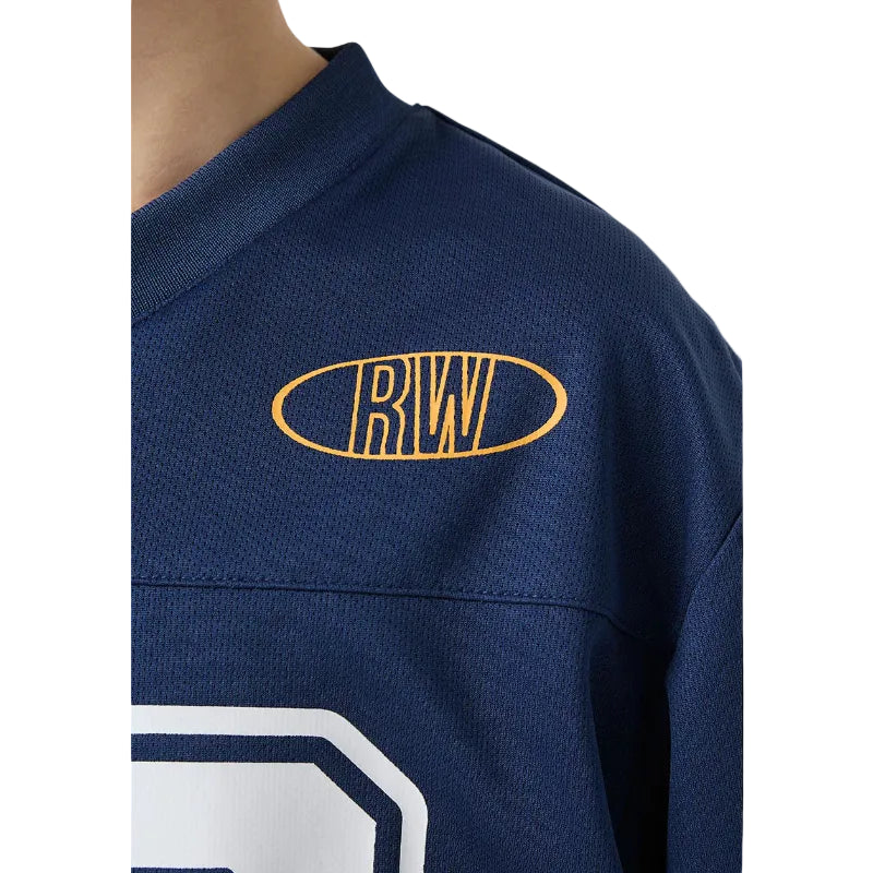 Navy blue sports jersey with a yellow logo