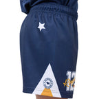 Navy blue shorts with a star, circular logo, and number 12 on a white background