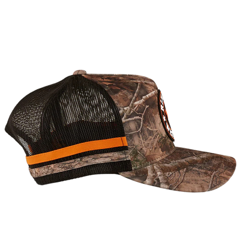 A camouflage/orange Ringers Western McCoy Trucker Cap (722038RW) with mesh back and orange accents on a white background.