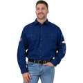 Man wearing a blue work shirt with patches on a white background