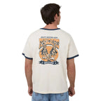 Man wearing an off white t-shirt with a graphic design on the back, standing against a white background