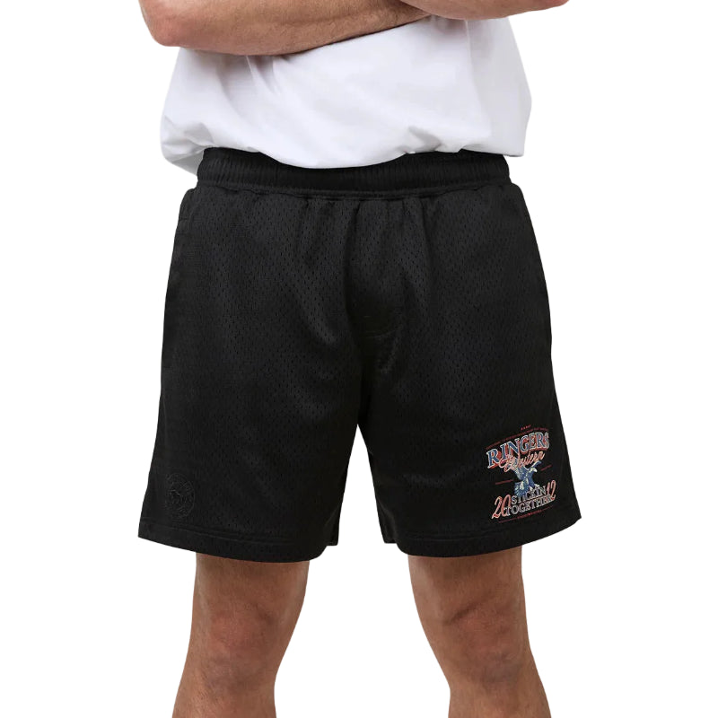 Black mesh athletic shorts with a white graphic logo on the lower leg, worn by a model with arms crossed.