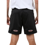 Black shorts with embroidered logos worn by a person on a plain background
