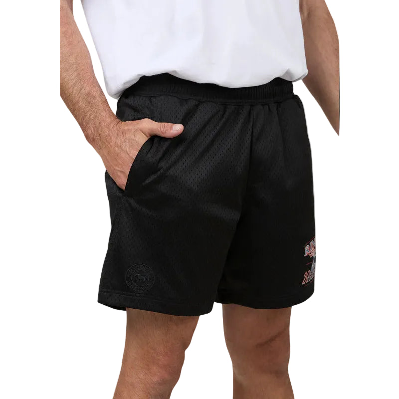 Person wearing black shorts with a brand logo on a white background