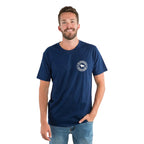 A man wearing a navy Ringers Western Men's Signature Bull Loose S/S Tee (120201560) with a Ringers Western logo on the chest, on a white studio background.