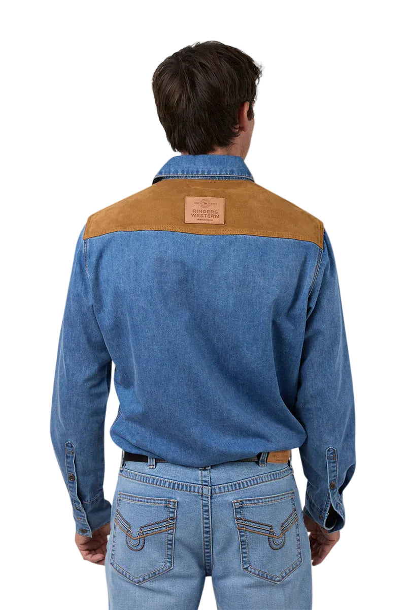 Man wearing a blue denim shirt with brown shoulder patches on a white background