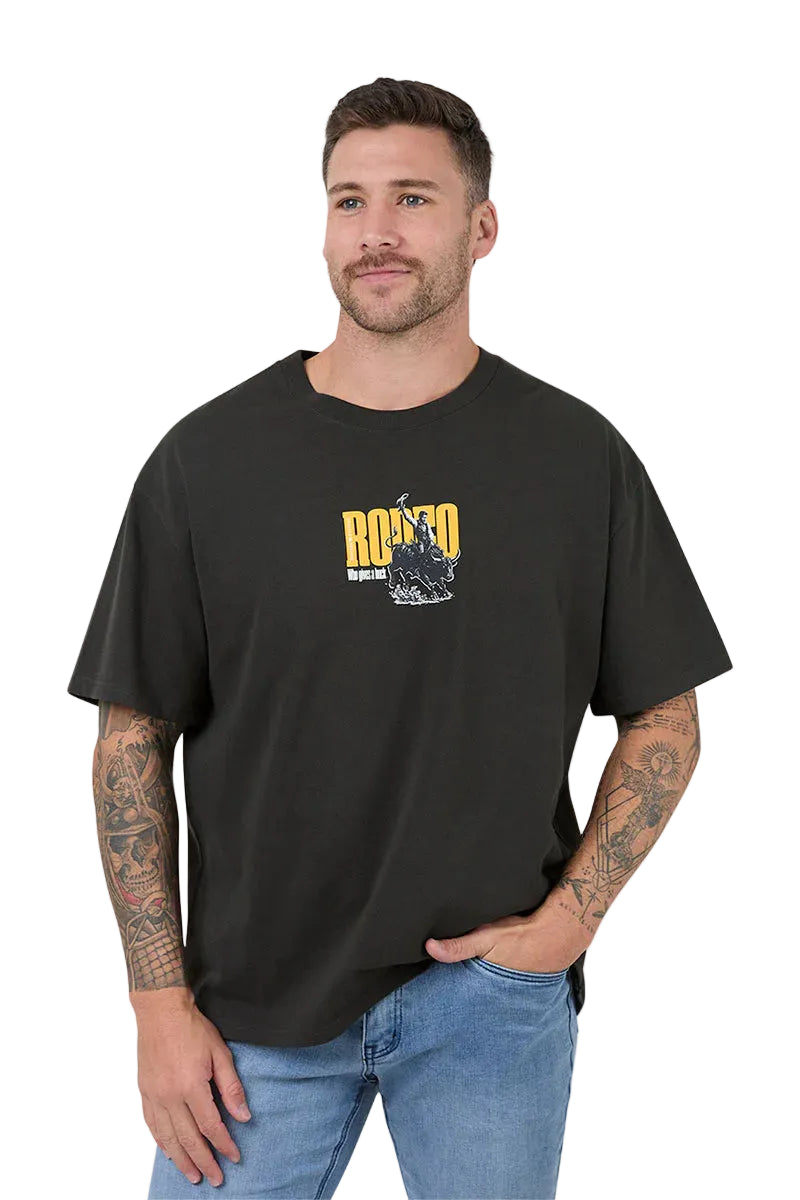 Man wearing a black t-shirt with a graphic design on a white background