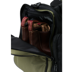 A black and army Ringers Western Rider Go Sports Bag (625130RW) duffel bag with 'Ringers' branding, featuring a top carry handle and showing the zipped end compartment with a pair of brown chelsea boots in it.