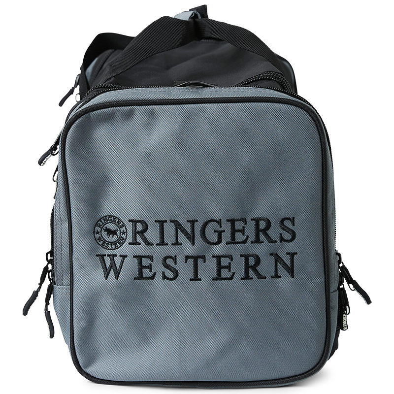 An end view of a black and charcoal Ringers Western Rider Go Sports Bag (625130RW) duffel bag with 'RINGERS' printed in black on the end pocket, shown on a plain white background.