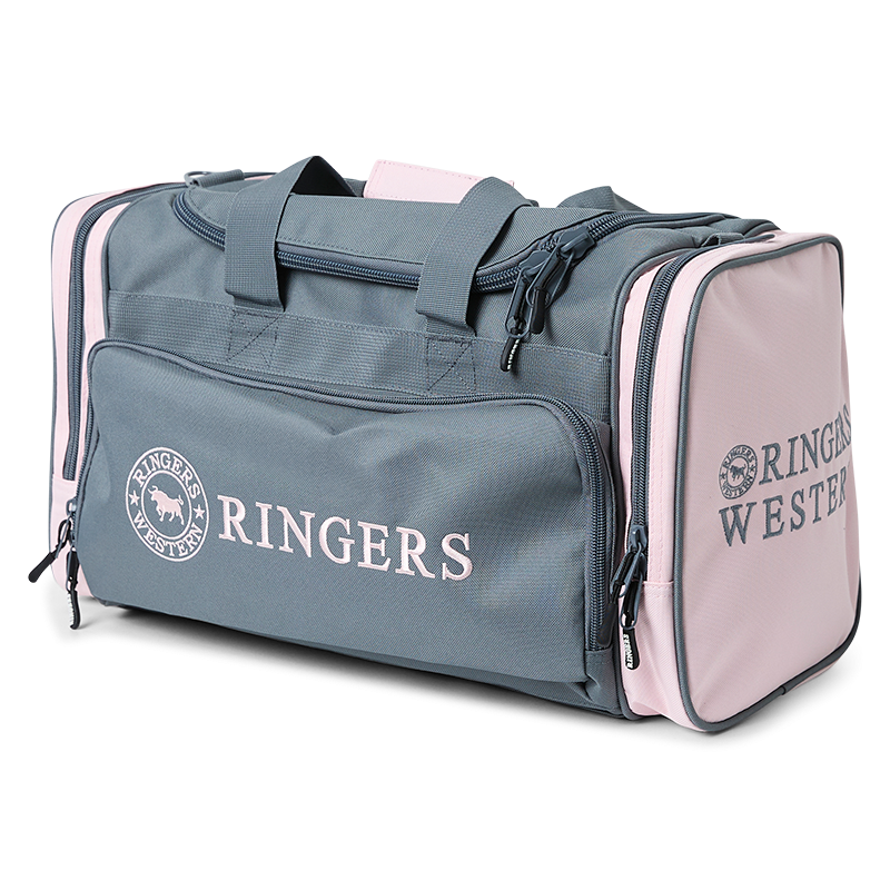 A Ringers Western Rider Go Sports Bag (625130RW) duffel bag in charcoal and pastel pink, featuring the brand logo on the front and side, with top carry handles and zippered compartments on a white background.