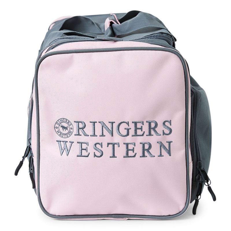 An end view of a Ringers Western Rider Go Sports Bag (625130RW) duffel bag in charcoal and pastel pink, featuring the brand logo and name, with top carry handles and zippered compartments on a white background.