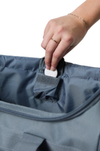 A charcoal and pastel pink Ringers Western Rider Go Sports Bag (625130RW) showing a small inside compartment for valuables.