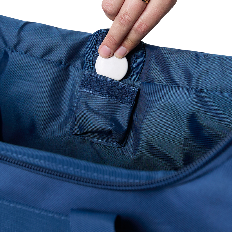A navy and brown Ringers Western Rider Go Sports Bag (625130RW) showing a small inside compartment for valuables.