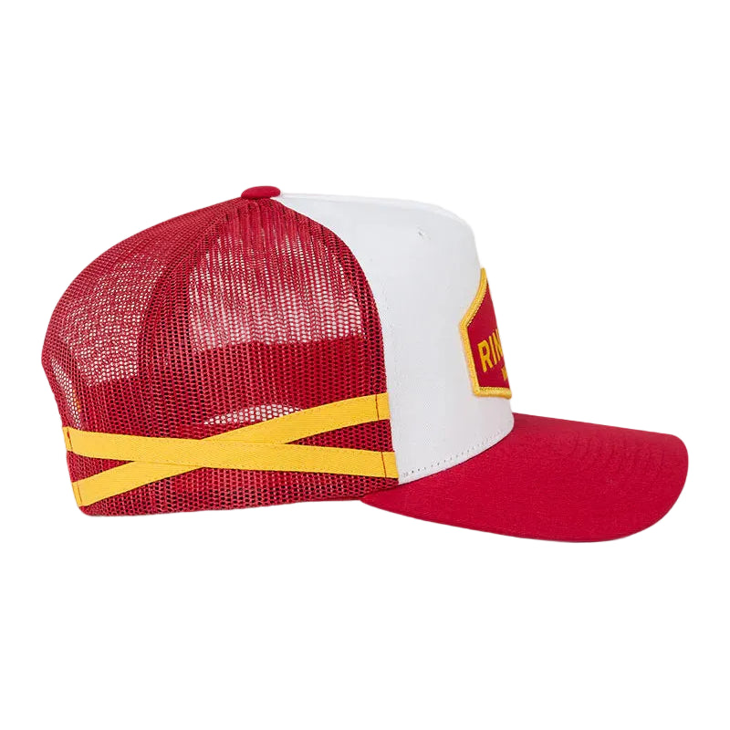 A red and white trucker-style cap with a yellow accent band and a small yellow logo patch on the side, photographed against a white background.