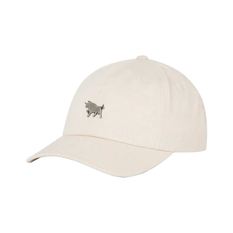 A light beige baseball cap with a small embroidered black bull logo on the front, set against a solid white background.