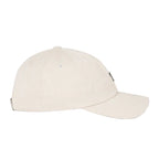 A light beige baseball cap shown from a side profile view against a solid, white background.