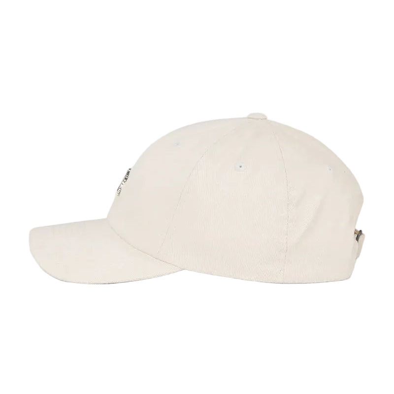A light cream-colored cotton baseball cap shown from a side profile view against a solid white background.