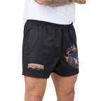 Black shorts with racing design and text on a plain background