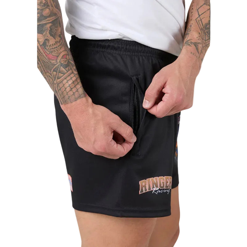 Person wearing black shorts with 'Ringers Racing' logo on a plain background