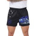 Black footy shorts with a blue and white semi-truck graphic and white star details, shown on a model wearing a white t-shirt against a white background.