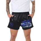 Black footy shorts with a blue and white truck graphic and southern cross stars, worn by a model with a white t-shirt.