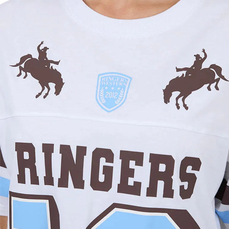 White t-shirt with brown and blue graphics and text, featuring a logo and text on a plain background.