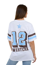 A woman shown from the back wearing a white short-sleeve football-style jersey with a light blue star, large light blue number 12 outlined in brown, and the word WESTERN in brown below it. The jersey also has light blue and brown sleeve stripes.